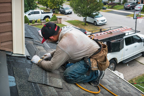 Professional Roofing technician working in Putnamville, IN